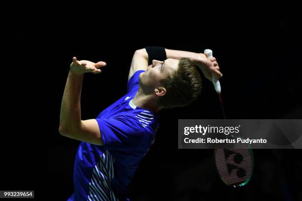 Viktor Axelsen of Denmark competes against Shi Yuqi of China during the Men's Singles Semi-final match on day five of the Blibli Indonesia Open at...