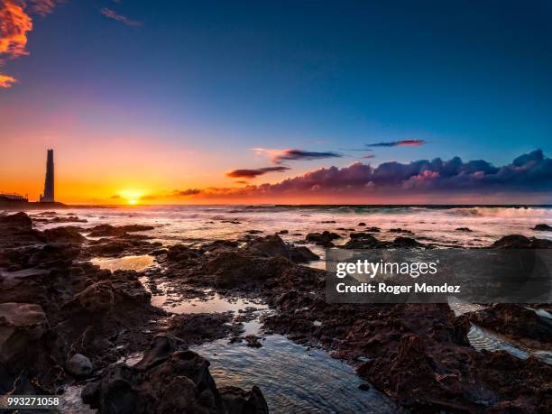 faro punta del hidalgo al atardecer copia - copia stockfoto's en -beelden