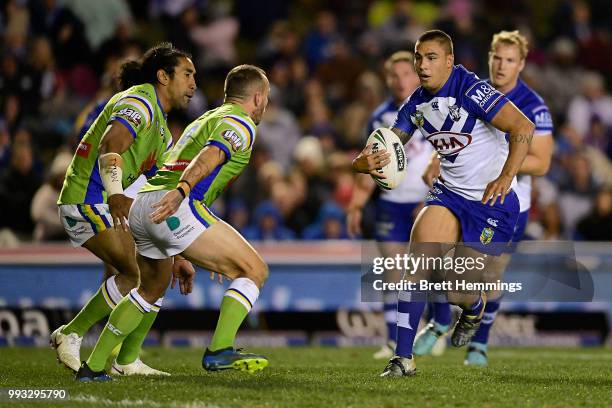 Michael Lichaa of the Bulldogs runs the ball during the round 17 NRL match between the Canterbury Bulldogs and the Canberra Raiders at Belmore Sports...