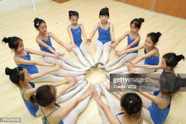 Children attend basic dance training at a dance training center on July 4, 2018 in Xiangyang, Hubei Province of China. Many Chinese children in...