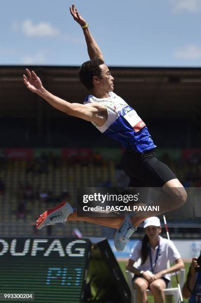 France's Cedric Dufag competes in the men's long jump competition during the Elite Athletics French Championships in Albi, southwestern France on...