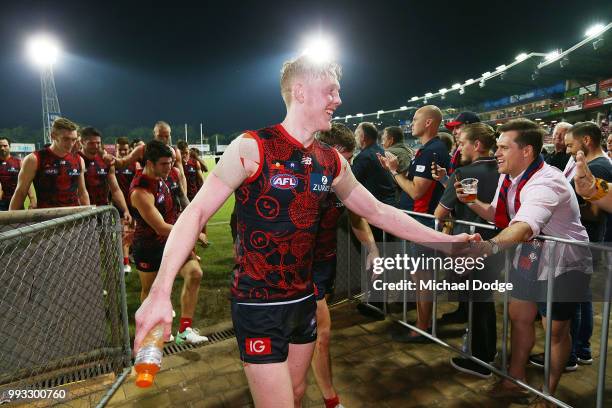 Clayton Oliver of the Demons celebrates the win during the round 16 AFL match between the Melbourne Demons and the Fremantle Dockers at TIO Stadium...