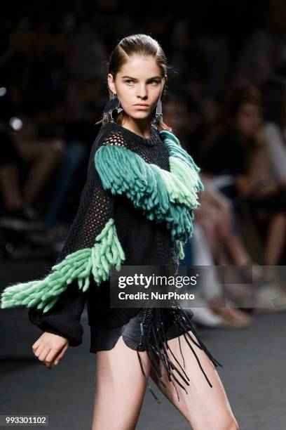 Model presents a creation by Spanish Jessica Conzen at the fashion show at the EGO Mercedes-Benz Fashion Week Madrid Spring-Summer 2019, in...