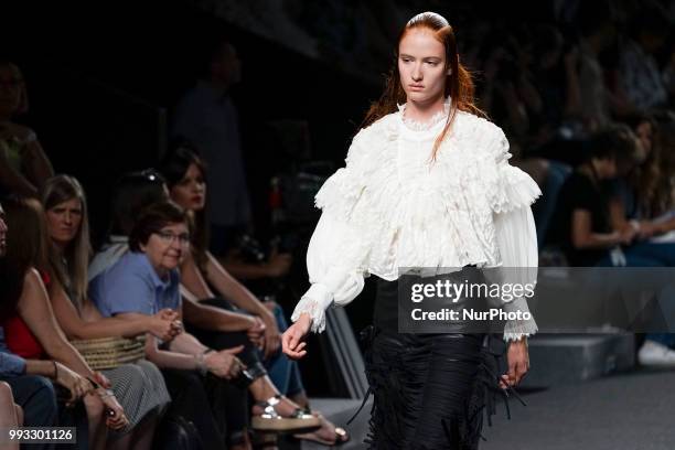 Model presents a creation by Spanish Jessica Conzen at the fashion show at the EGO Mercedes-Benz Fashion Week Madrid Spring-Summer 2019, in...