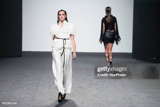 Model presents a creation by Spanish Jessica Conzen at the fashion show at the EGO Mercedes-Benz Fashion Week Madrid Spring-Summer 2019, in...