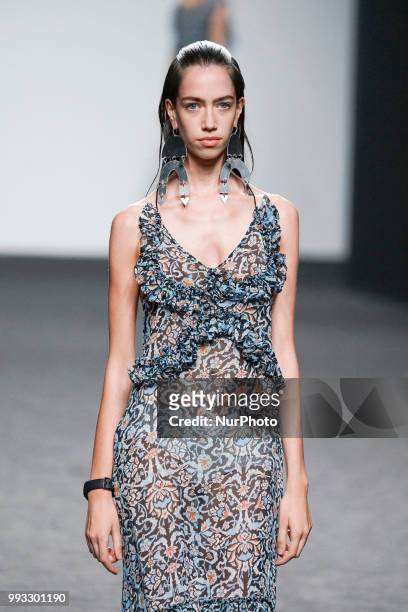 Model presents a creation by Spanish Jessica Conzen at the fashion show at the EGO Mercedes-Benz Fashion Week Madrid Spring-Summer 2019, in...
