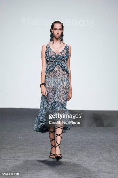Model presents a creation by Spanish Jessica Conzen at the fashion show at the EGO Mercedes-Benz Fashion Week Madrid Spring-Summer 2019, in...