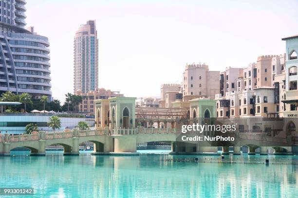 Daily life with the construction of many high buildings as seen in August of 2011 in Dubai, UAE. Among the buildings is the talest in the world, Burj...