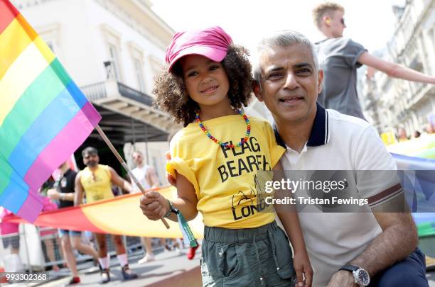 Mayor of London Sadiq Khan with young flag bearer during the Pride In London parade on July 7, 2018 in London, England. It is estimated over 1...