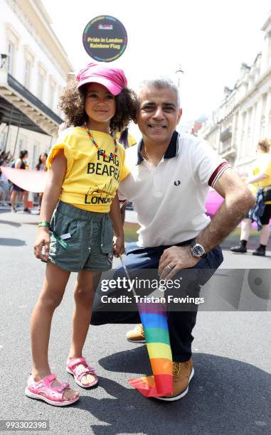 Mayor of London Sadiq Khan with young flag bearer during the Pride In London parade on July 7, 2018 in London, England. It is estimated over 1...