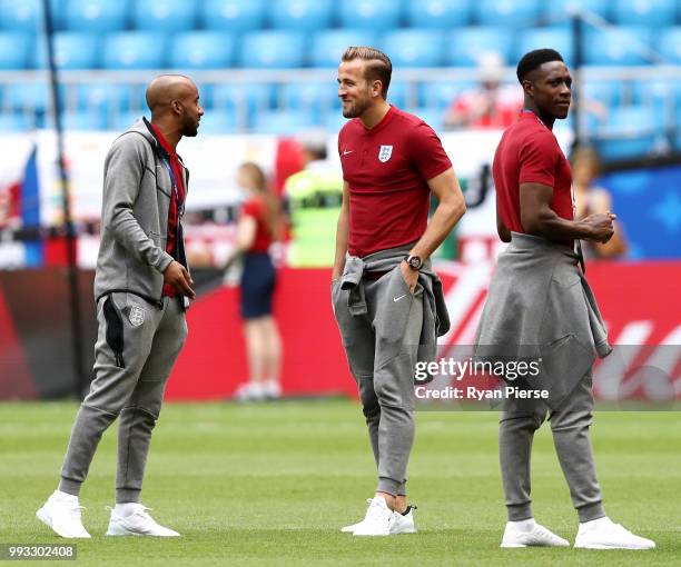 Fabian Delph and Harry Kane of England discuss during pitch inspection prior to the 2018 FIFA World Cup Russia Quarter Final match between Sweden and...