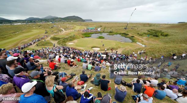 General view of the 7th green with Rory McIlroy of Northern Ireland chipping up to the green during the third round of the Dubai Duty Free Irish Open...