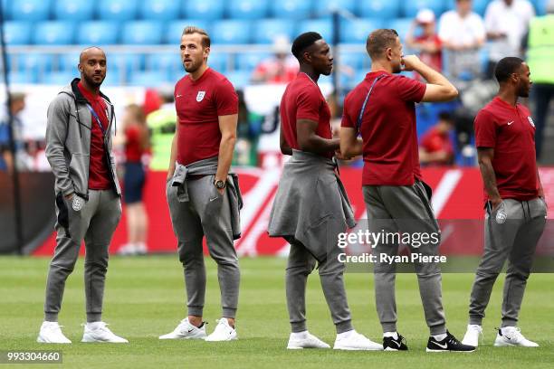 Fabian Delph and Harry Kane of England look on during pitch inspection prior to the 2018 FIFA World Cup Russia Quarter Final match between Sweden and...