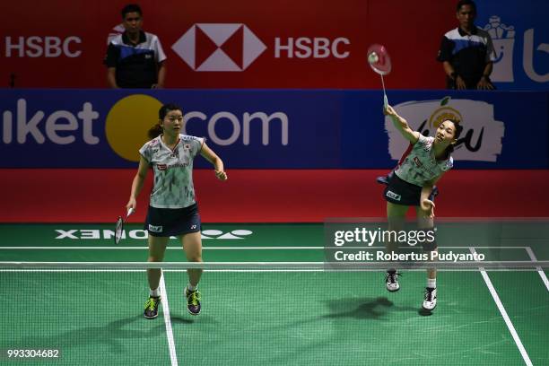 Misaki Matsutomo and Ayaka Takahashi of Japan compete against Yuki Fukushima and Sayaka Hirota of Japan during the Women's Doubles Semi-final match...