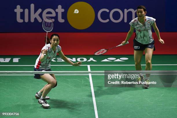 Misaki Matsutomo and Ayaka Takahashi of Japan compete against Yuki Fukushima and Sayaka Hirota of Japan during the Women's Doubles Semi-final match...