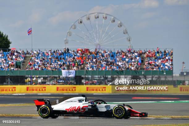 Haas F1's French driver Romain Grosjean drives during the qualifying session at Silverstone motor racing circuit in Silverstone, central England, on...