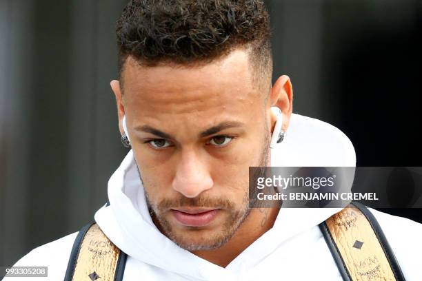Brazil's forward Neymar leaves his team's hotel in Kazan on July 7 a day after the five-time champions crashed out of the Russia 2018 World Cup...