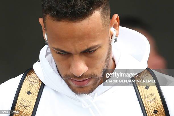 Brazil's forward Neymar leaves his team's hotel in Kazan on July 7 a day after the five-time champions crashed out of the Russia 2018 World Cup...