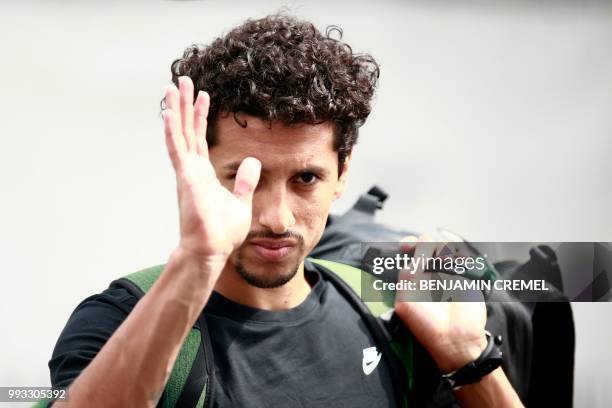 Brazil's defender Marquinhos leaves his team's hotel in Kazan on July 7 a day after the five-time champions crashed out of the Russia 2018 World Cup...