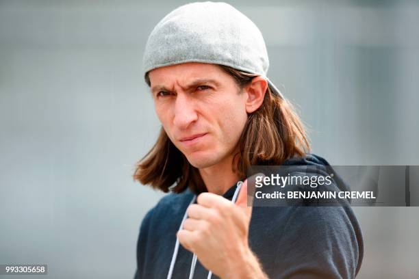 Brazil's defender Filipe Luis leaves his team's hotel in Kazan on July 7 a day after the five-time champions crashed out of the Russia 2018 World Cup...
