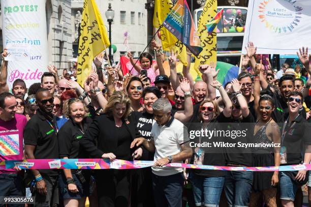 Mayor of London Sadiq Khan and Secretary of State for International Development Penny Mordaunt cut the flag to officially launch the Pride in London...