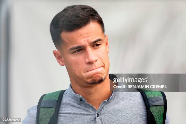 Brazil's forward Philippe Coutinho leaves his team's hotel in Kazan on July 7 a day after the five-time champions crashed out of the Russia 2018...