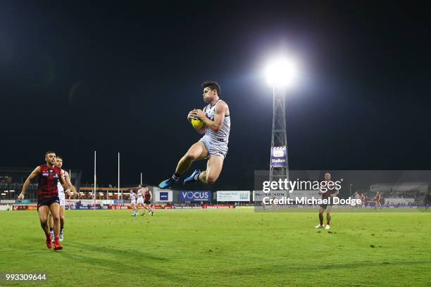 Lachie Neale of the Dockers marks the ball during the round 16 AFL match between the Melbourne Demons and the Fremantle Dockers at TIO Stadium on...