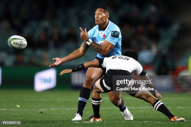 Israel Folau of the Waratahs passes during the round 18 Super Rugby match between the Waratahs and the Sunwolves at Allianz Stadium on July 7, 2018...