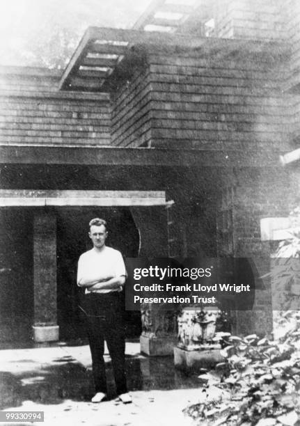 David Wright standing in front of garage and apartment entry, at the Frank Lloyd Wright Home and Studio, located at 951 Chicago Avenue, Oak Park,...