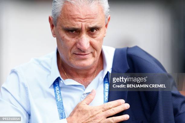 Brazil's coach Tite leaves his team's hotel in Kazan on July 7 a day after the five-time champions crashed out of the Russia 2018 World Cup football...
