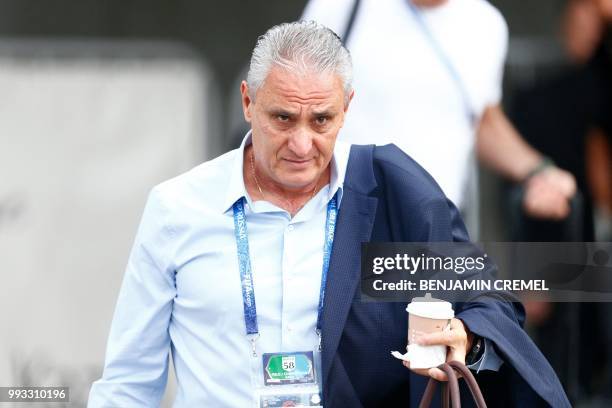 Brazil's coach Tite leaves his team's hotel in Kazan on July 7 a day after the five-time champions crashed out of the Russia 2018 World Cup football...