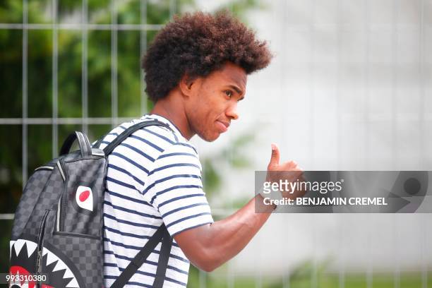Brazil's forward Willian leaves his team's hotel in Kazan on July 7 a day after the five-time champions crashed out of the Russia 2018 World Cup...