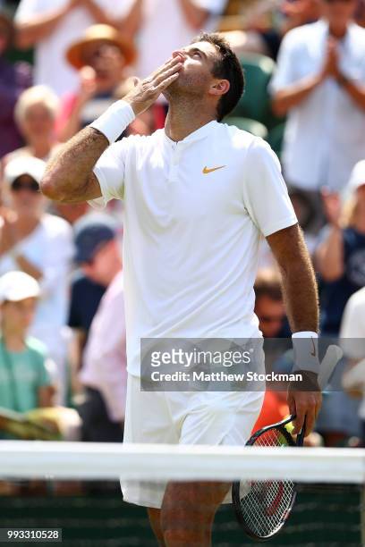 Juan Martin del Potro of Argentina celebrates after defeating Benoit Paire of France in their Men's Singles third round match on day six of the...