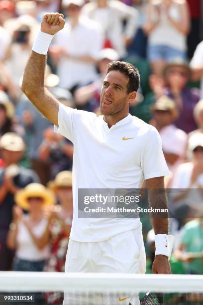 Juan Martin del Potro of Argentina celebrates after defeating Benoit Paire of France in their Men's Singles third round match on day six of the...