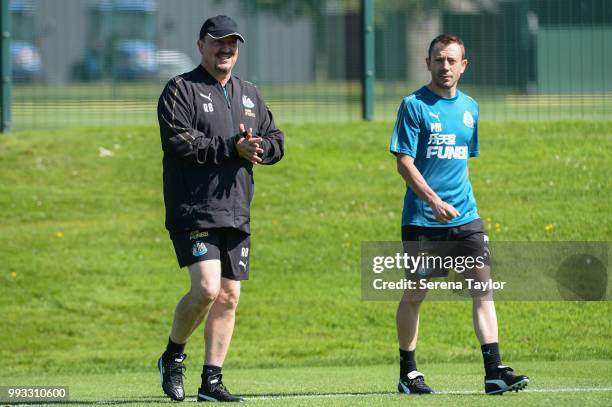 Newcastle United Manager Rafael Benitez and Newcastle United Assistant Manager Francisco De Miguel Moreno walk out to begin the Newcastle United...