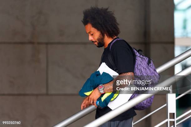 Brazil's defender Marcelo leaves his team's hotel in Kazan on July 7 a day after the five-time champions crashed out of the Russia 2018 World Cup...