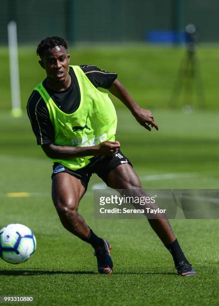 Rolando Aarons passes the ball during the Newcastle United Training Session at the Newcastle United Training Centre on July 7 in Newcastle upon Tyne,...