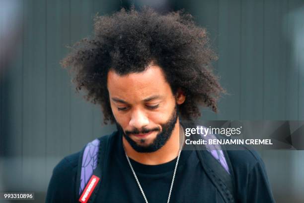 Brazil's defender Marcelo leaves his team's hotel in Kazan on July 7 a day after the five-time champions crashed out of the Russia 2018 World Cup...