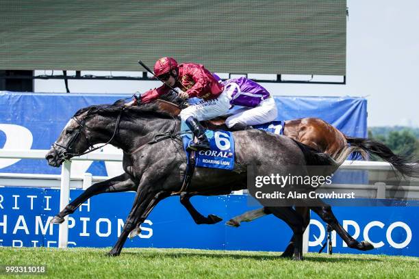 Oisin Murphy riding Roaring Lion win The Coral Eclipse from Saxon Warrior at Sandown Park on July 7, 2018 in Esher, United Kingdom.