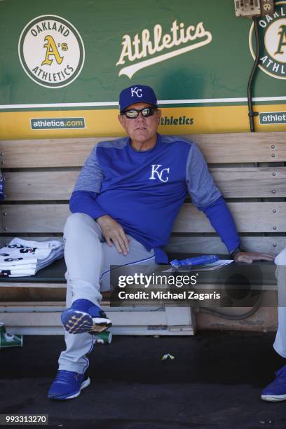 Manager Ned Yost of the Kansas City Royals sits in the dugout prior to the game against the Oakland Athletics at the Oakland Alameda Coliseum on June...