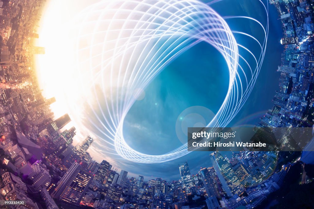 Planet shape panorama cityscape with light trail at dusk