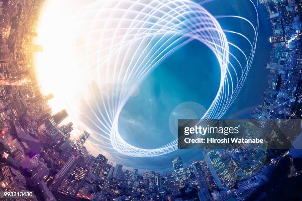 planet shape panorama cityscape with light trail at dusk - global communications foto e immagini stock
