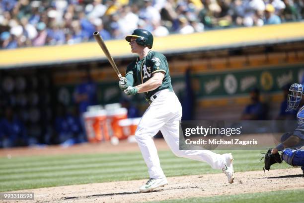 Matt Chapman of the Oakland Athletics hits a home run during the game against the Kansas City Royals at the Oakland Alameda Coliseum on June 10, 2018...