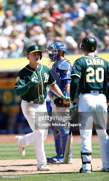 Matt Chapman of the Oakland Athletics celebrates after hitting a home run during the game against the Kansas City Royals at the Oakland Alameda...