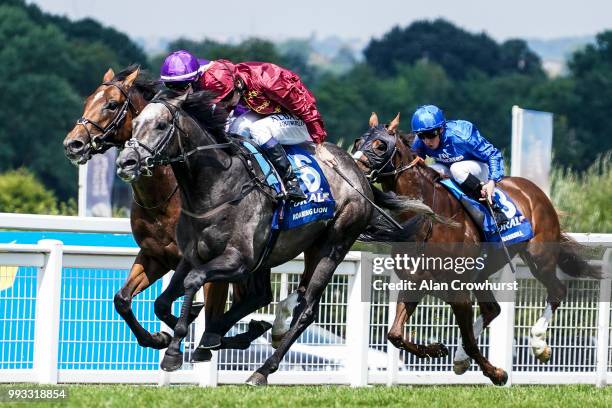 Oisin Murphy riding Roaring Lion win The Coral Eclipse from Saxon Warrior at Sandown Park on July 7, 2018 in Esher, United Kingdom.