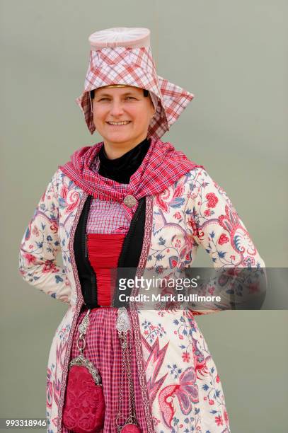 Maureen Smid of 'Aald Hielpen a traditional Dutch Folk Dancing team both pose for a picture at the 25th Sheringham Potty Festival on July 7, 2018 in...