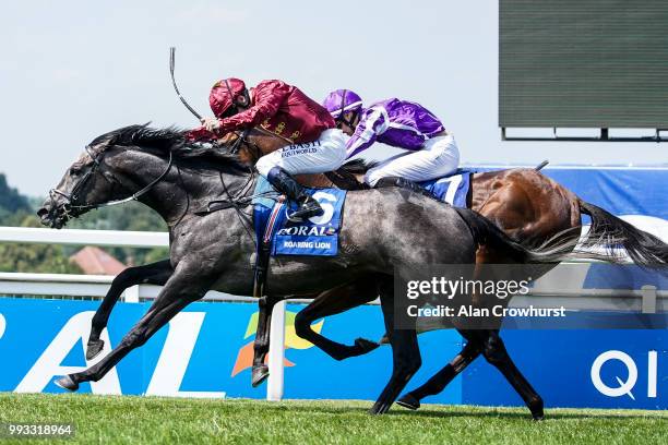 Oisin Murphy riding Roaring Lion win The Coral Eclipse from Saxon Warrior at Sandown Park on July 7, 2018 in Esher, United Kingdom.