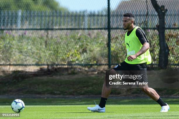 Jamaal Lascelles passes the ball during the Newcastle United Training Session at the Newcastle United Training Centre on July 7 in Newcastle upon...
