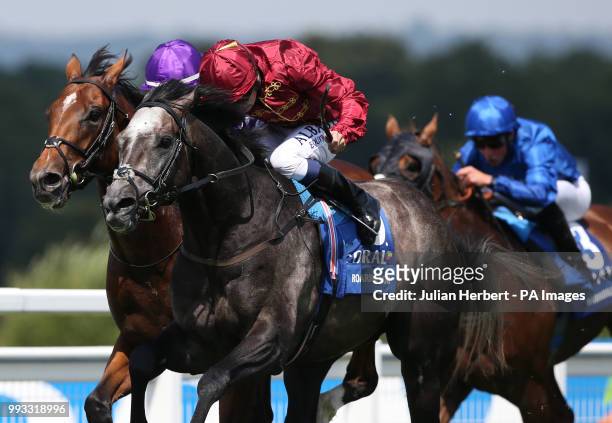 Roaring Lion ridden by Oisin Murphy get the better of Saxon Warrior ridden by Donnacha OÕ Brien to win The Coral-Eclipse Race run during Coral...