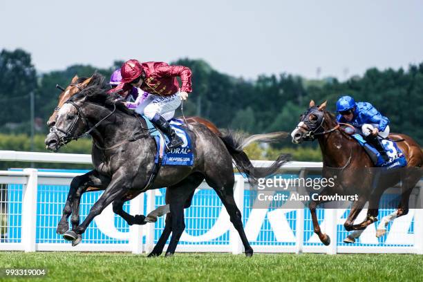 Oisin Murphy riding Roaring Lion win The Coral Eclipse from Saxon Warrior at Sandown Park on July 7, 2018 in Esher, United Kingdom.